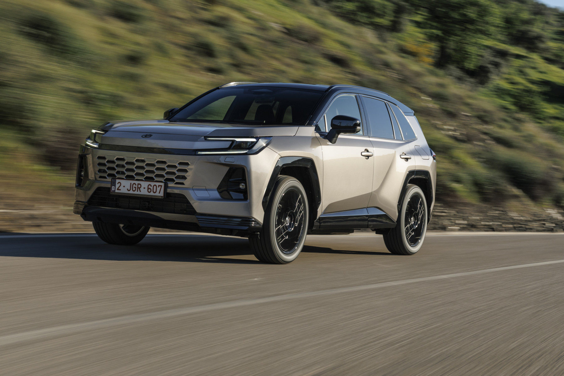 Toyota RAV4 Hybrid driving on a mountain road – Ireland 2026 buyer’s guide