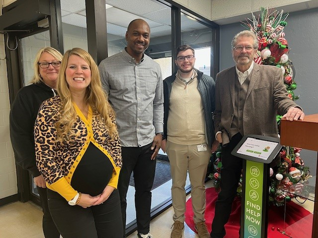 Group photo of kiosk at Friendship House