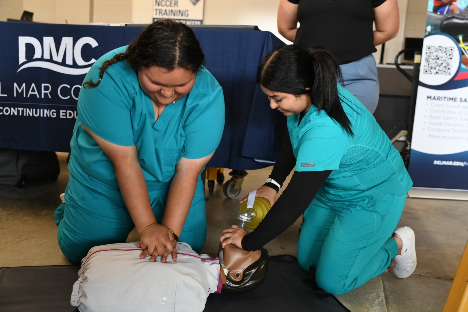 CPR Demonstration with two DMC students