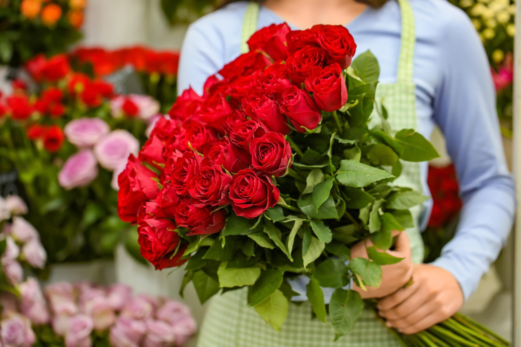 Seller with bouquet