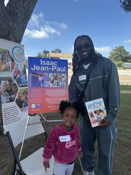 Jean-Paul with his daughter. Photo courtesy of Isaac Jean-Paul.