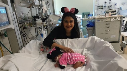 Shivan Malavia with daughter Siya in matching Minnie Mouse costumes. Photo by Cedars-Sinai.