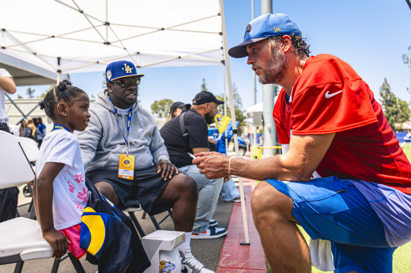 Avery Brown with Rams quarterback, Matthew Stafford. Photo by Rams.
