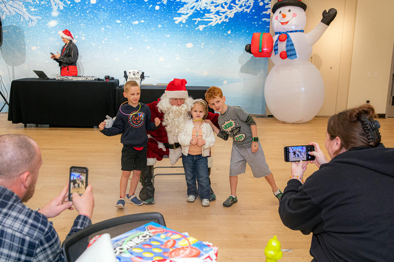 Siblings having fun last year at the Cedars-Sinai Guerin Children's holiday party for young cancer patients. Photo by Cedars-Sinai.