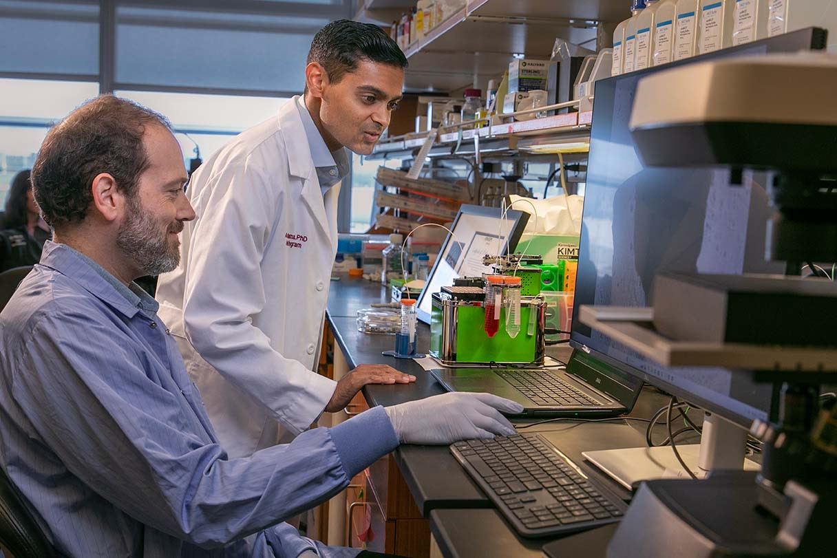 Arun Sharma, PhD, at right, and Sharma Lab member Paul Linesch, PhD. Photo by Cedars-Sinai.