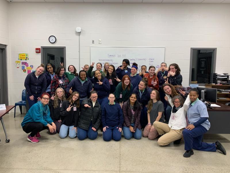 An OPEEP class poses for a silly photo