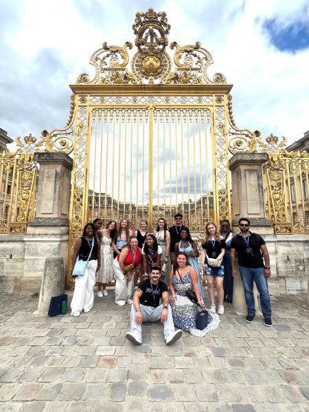 The trip included a visit to the historic Palace of Versailles.