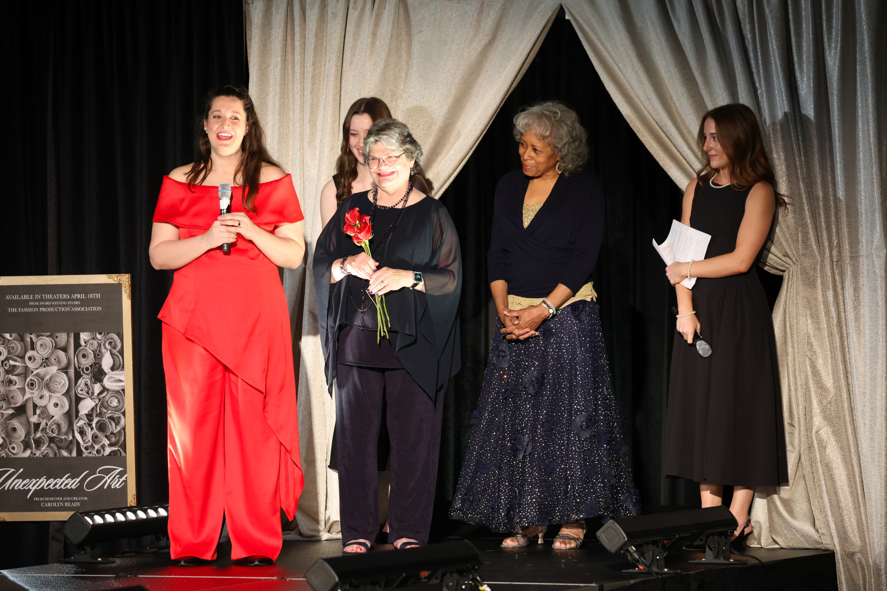 Advisers Alex Suer (left), Nancy Rudd and Carolyn Ready speak as FPA Co-Presidents Ellie Michaelis and Allie Gumeny look on.