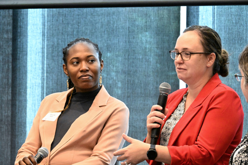 Ohio State graduate student Sherifat Alabi (left)  listens as Professor Joy Rumble describes  engagement work.