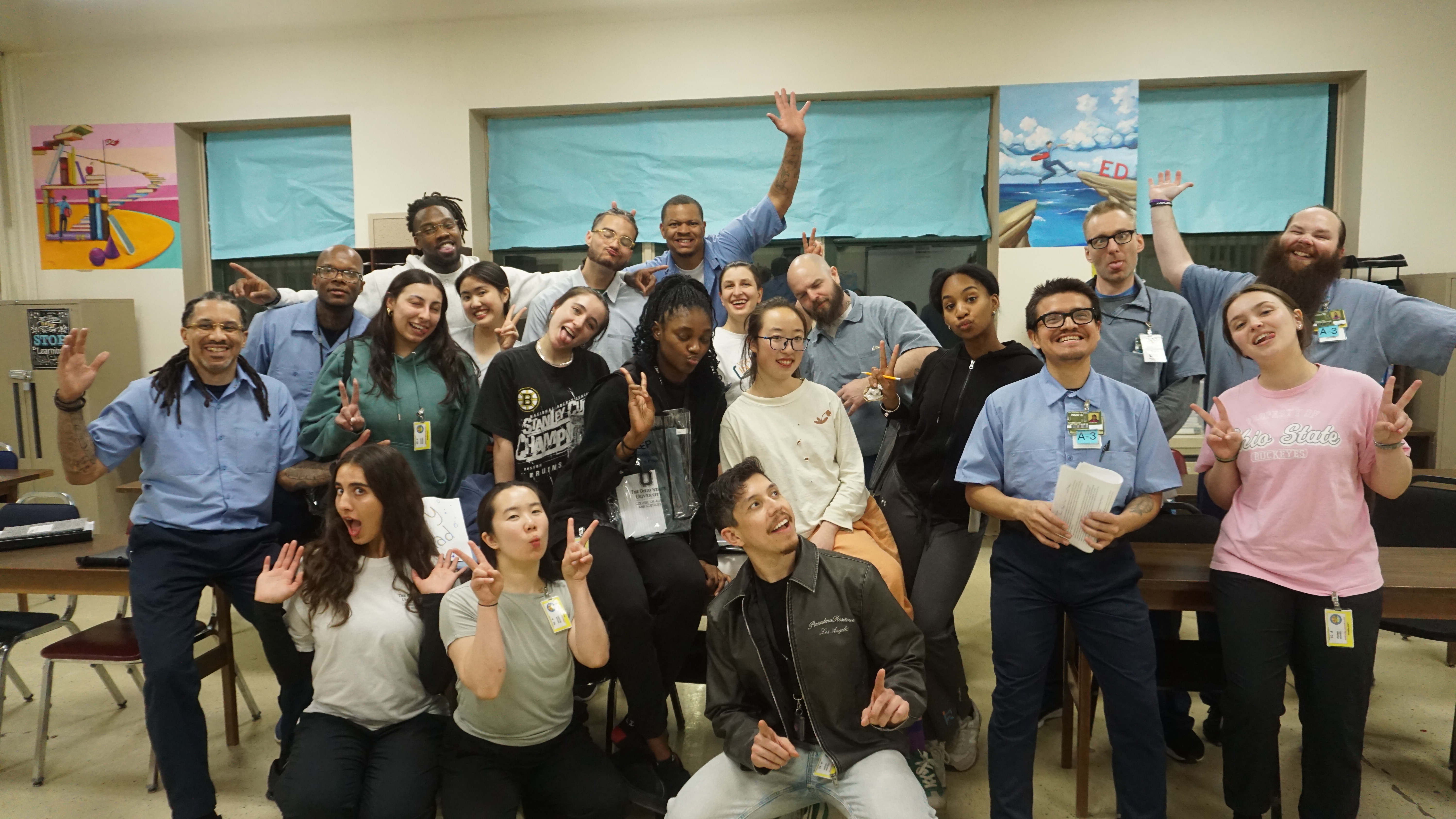 The Citizen Artists class pose for a group photo.
