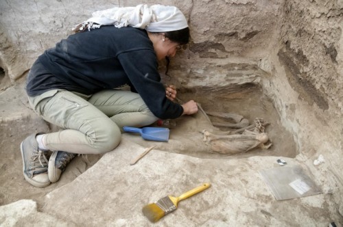 Nada Elias excavating an adult skeleton.