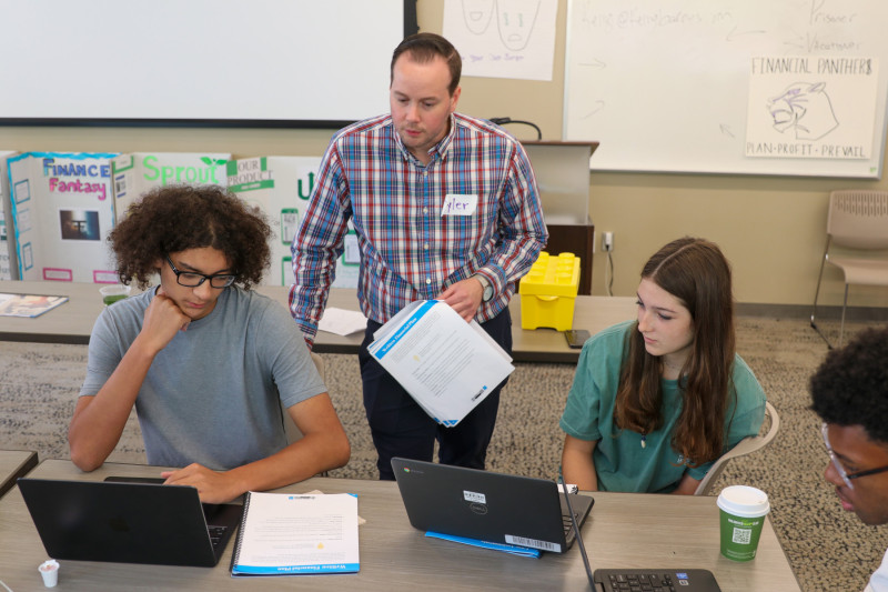 Professional financial planners advised the student teams throughout the week.