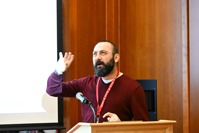 Onur Ozkaynak, a teaching and learning graduate student, presented research on how AI tools interpret accents.