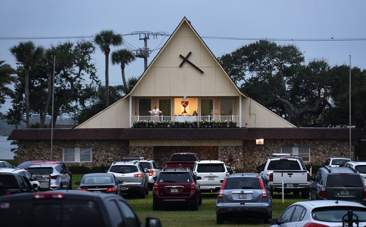 Car horns mark ‘amens’ at drive-in church services, such as this one in Daytona Beach, Florida.