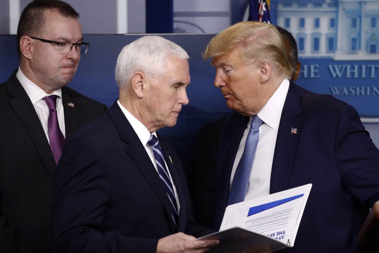 Pence and Trump attend a coronavirus task force briefing.