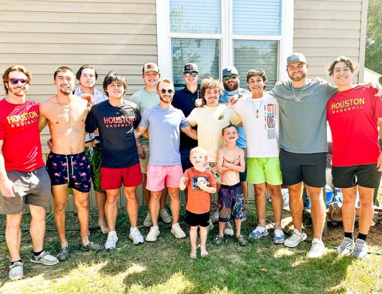 Michael Ead and his younger brother, Gunnarr Dull, at Michael's birthday bash with UST-Houston players and coaches