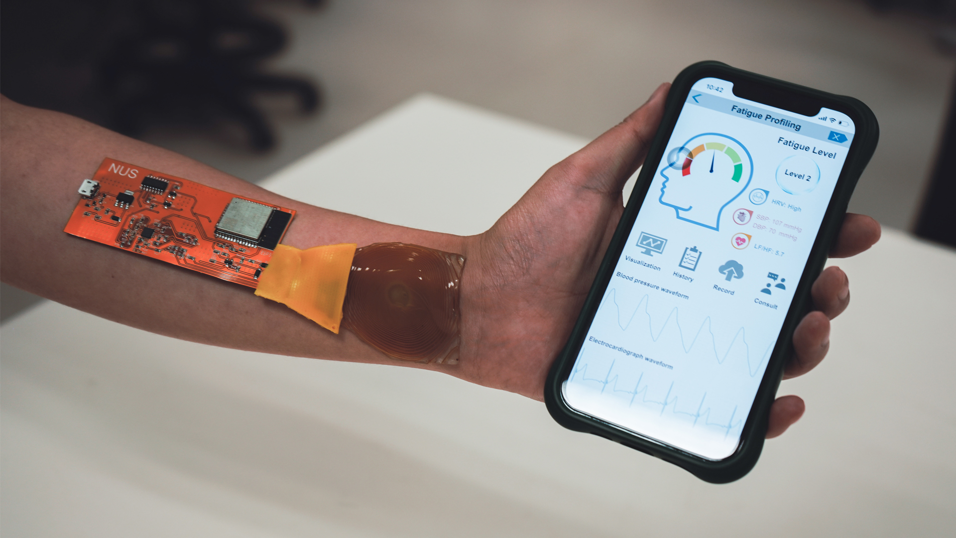 NUS smart sensor decodes fatigue and stress from body signals on the move