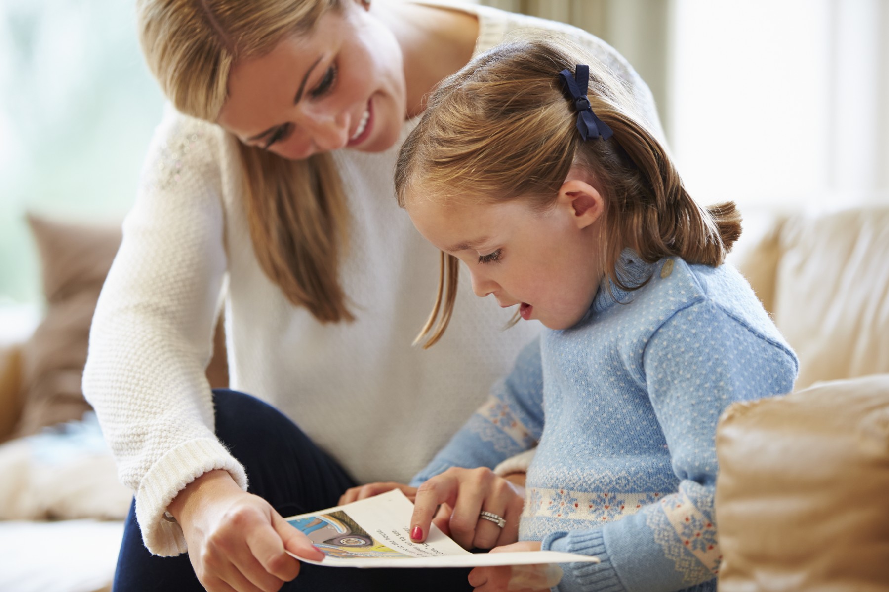 Reading mom and daughter