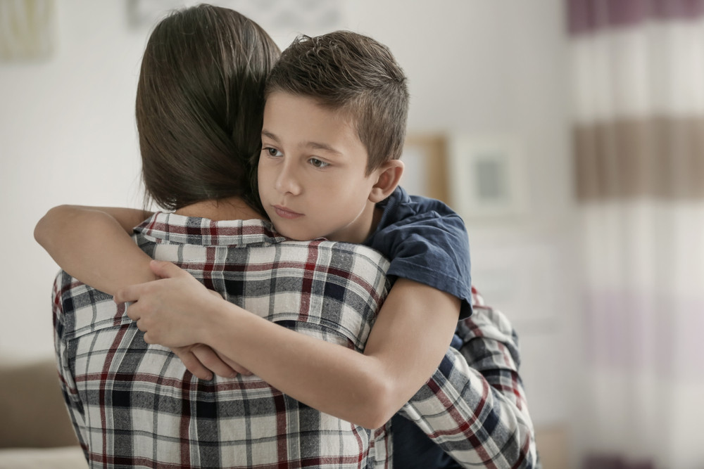 sad-little-boy-hugging-his-450w-793067629.jpg