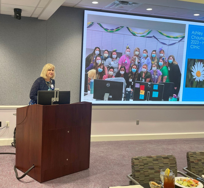 Cheryl presenting at Daisy Luncheon