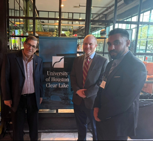 From left-Professor of Healthcare Administration, Dr. Phillip Decker, Dr. Mitchell, and Dr. Sam Zuberi.