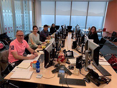 Papadacos_Peggy_with work team_Jan2026