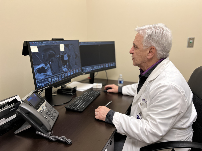 Dr Caron reviewing scans