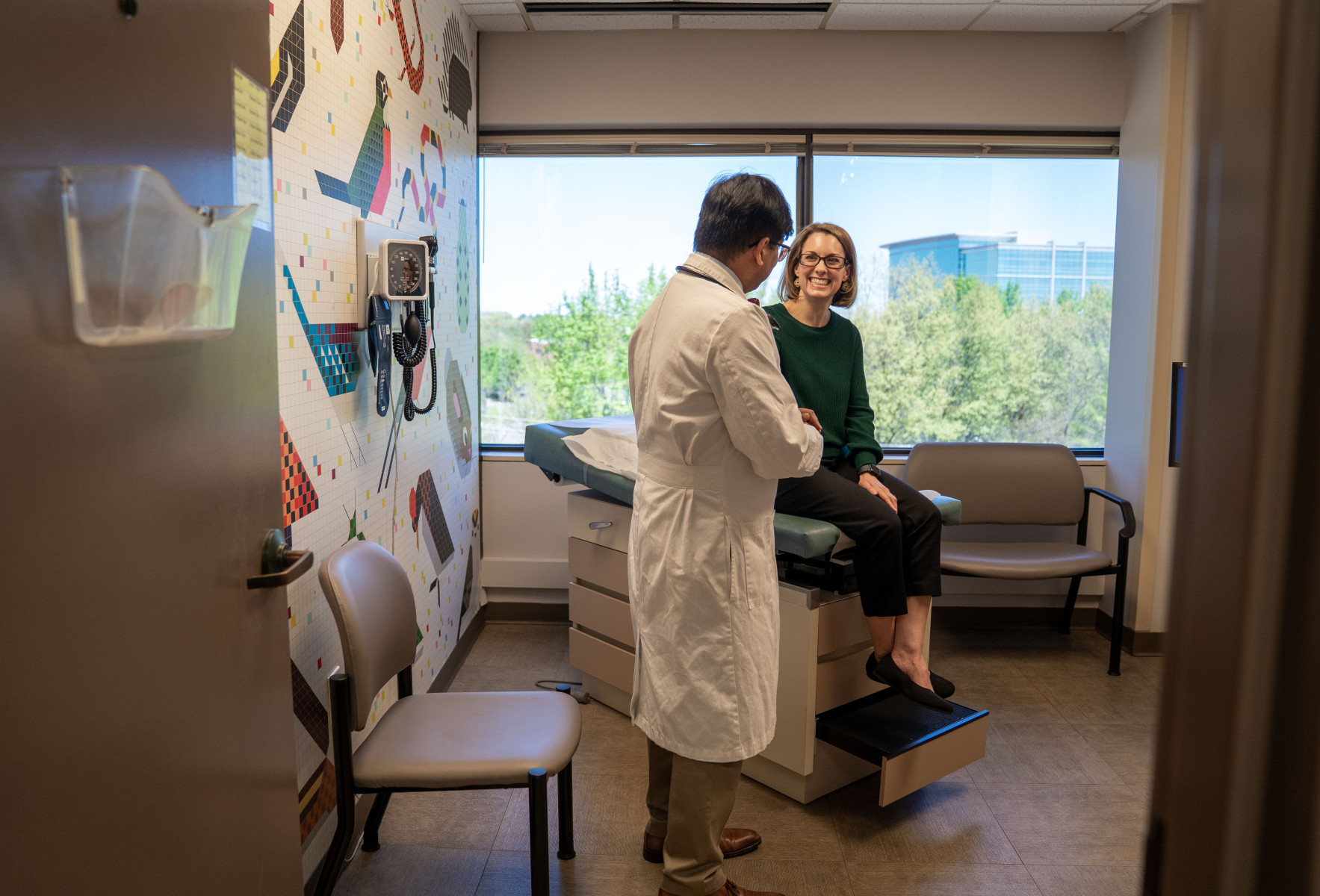 Dr. Bhat greets a new patient.