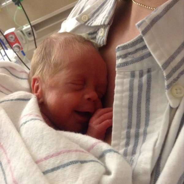 Campbell snuggles up to his mom during kangaroo care.
