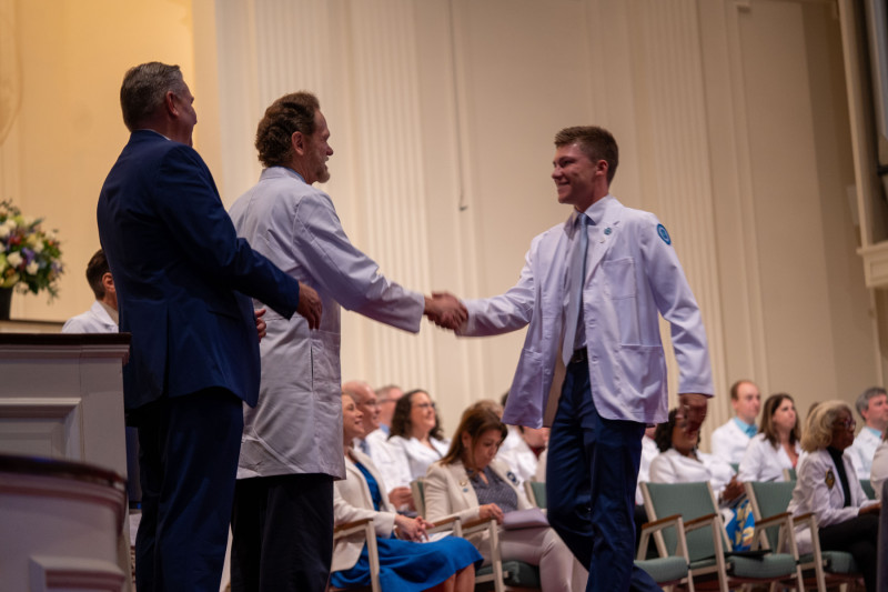 Dr. Peter Bell welcomes a new student.