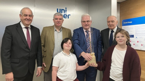 Tree presentation: The Rt Hon. Sir Mark Tami MP (centre) presents school children with the tree sapling with The Rt Hon. the Lord Hanson of Flint (end left ), Tony Higgins, Plant Manager at Uniper&rsquo;s Connah&rsquo;s Quay power station (middle …