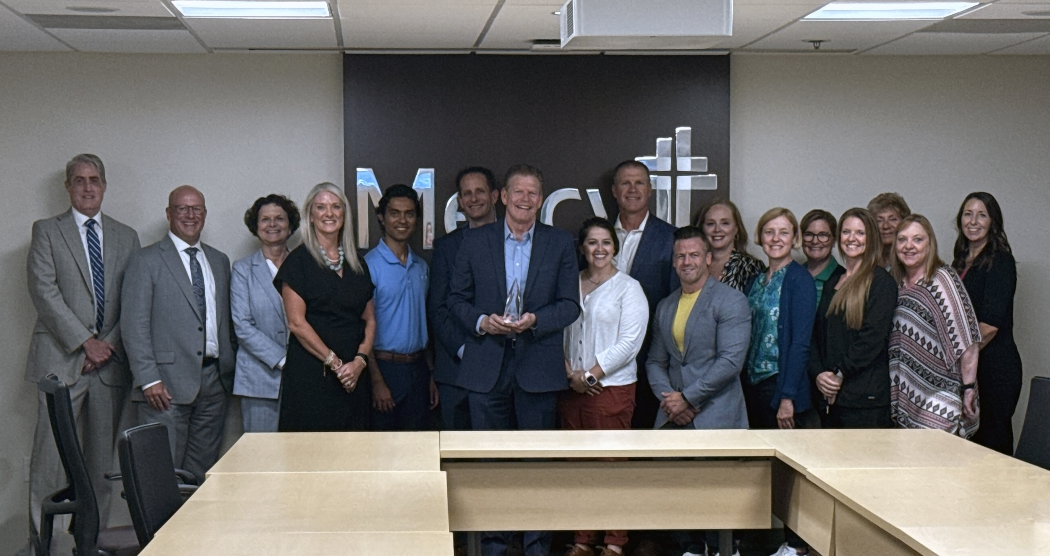 Eric Ammons AHA Award presentation with Mercy Southeast Communities Leadership