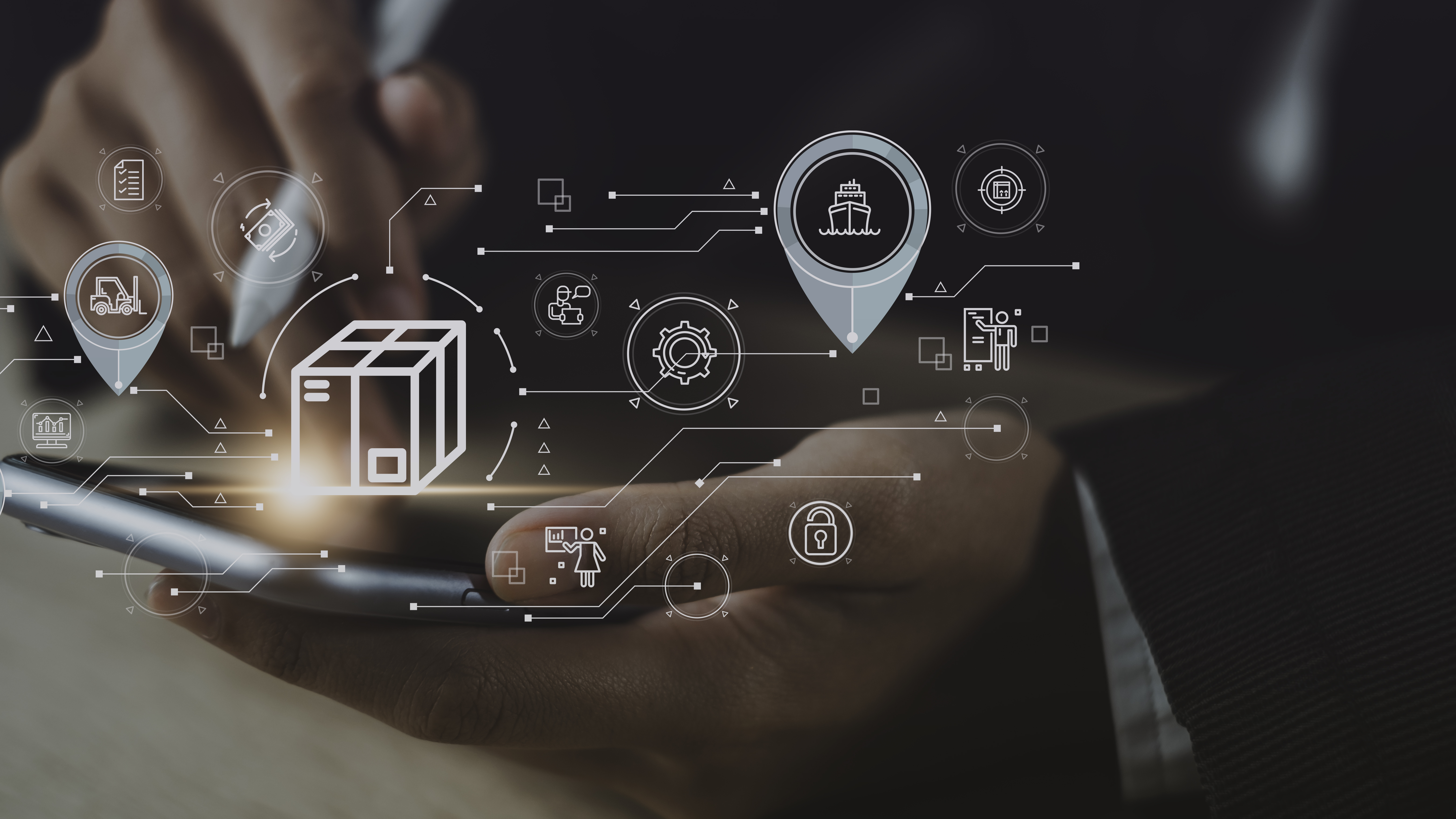Hand holding smartphone with digital supply chain icons representing shipment tracking and logistics technology