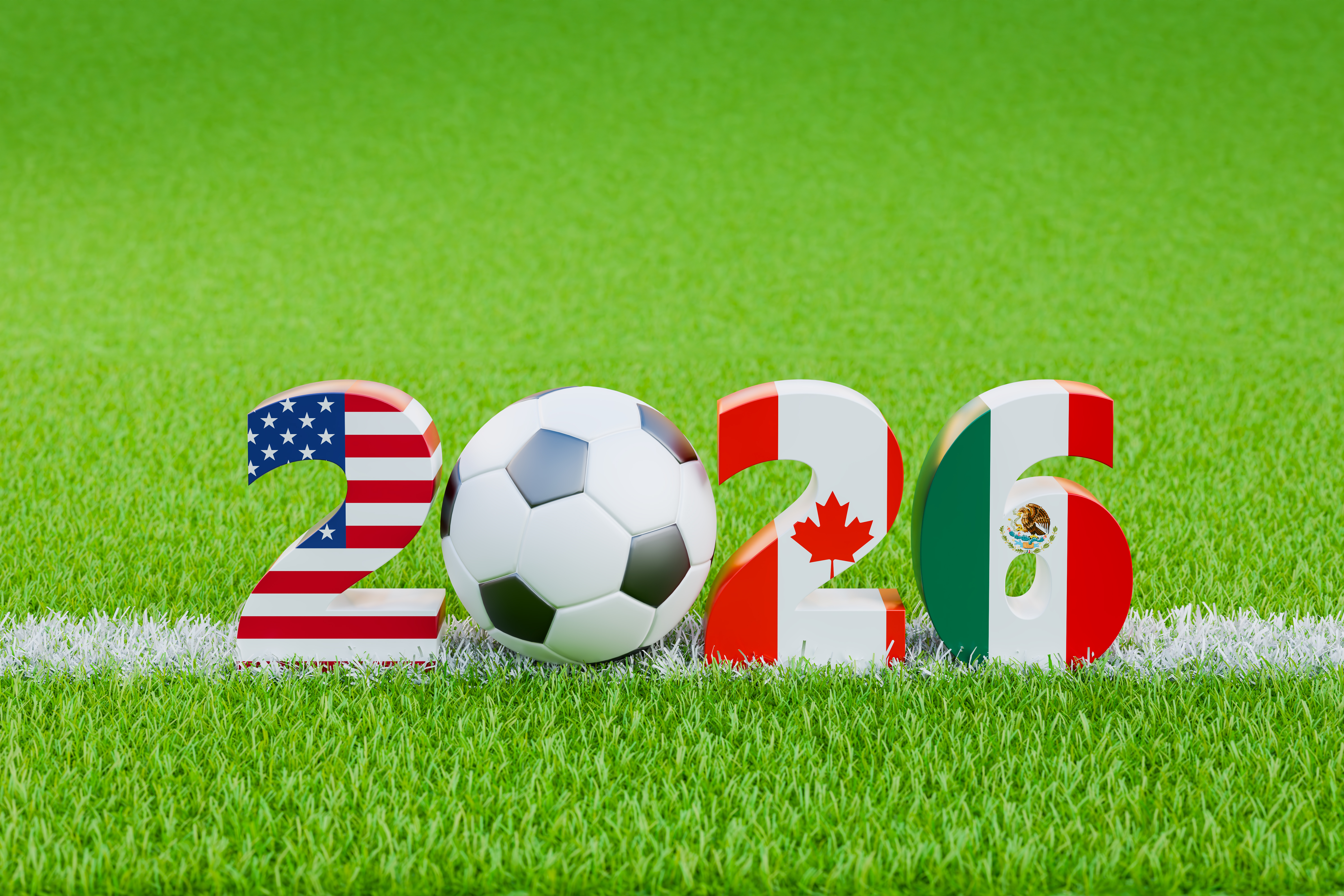 A soccer ball between the digits 2_26 on green grass with a chalk line. The digits colored in American, Mexican, Canadian flags to represent the 2026 FIFA World Cup.